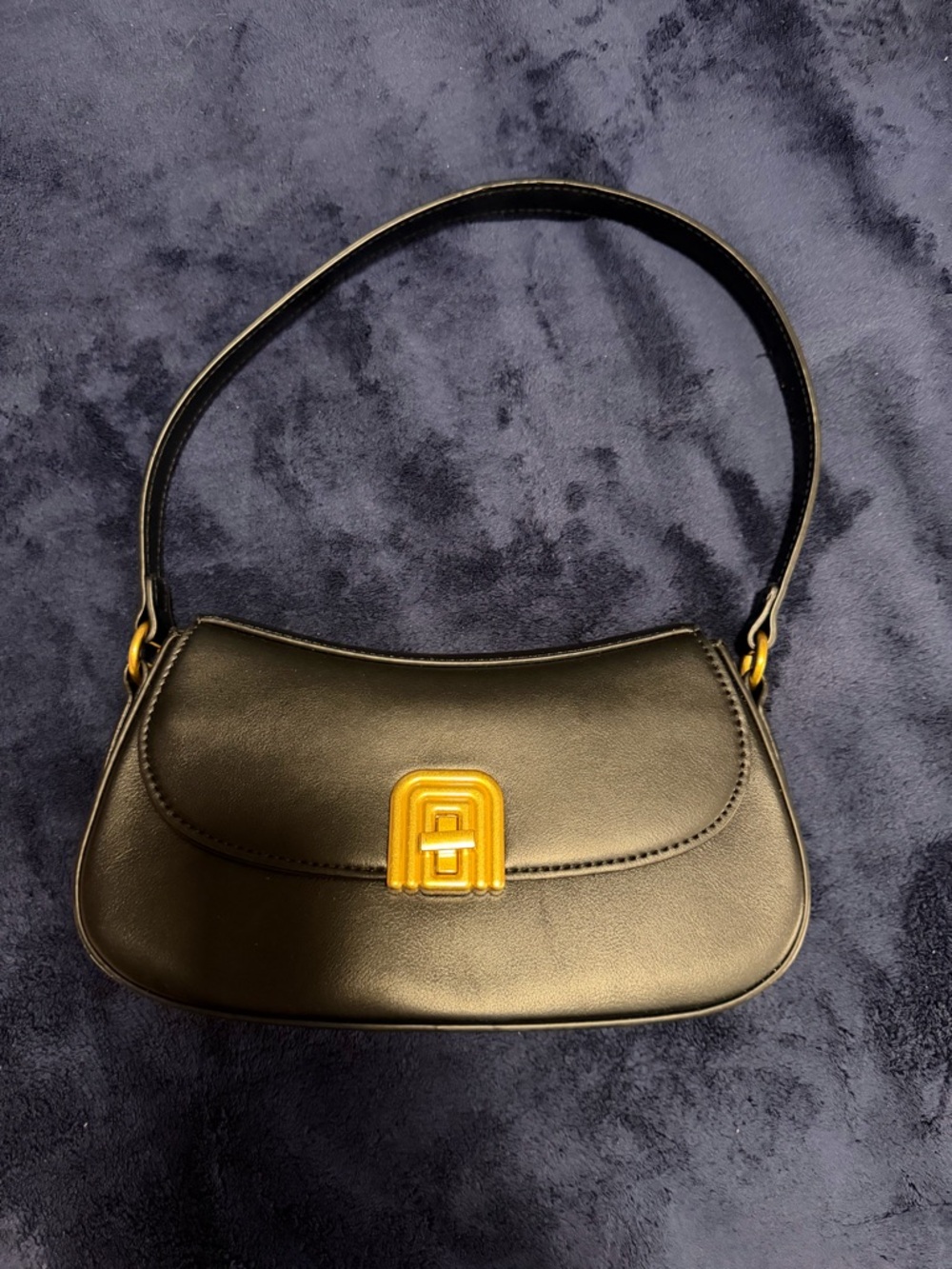 Black Leather Shoulder Bag with Gold Accent